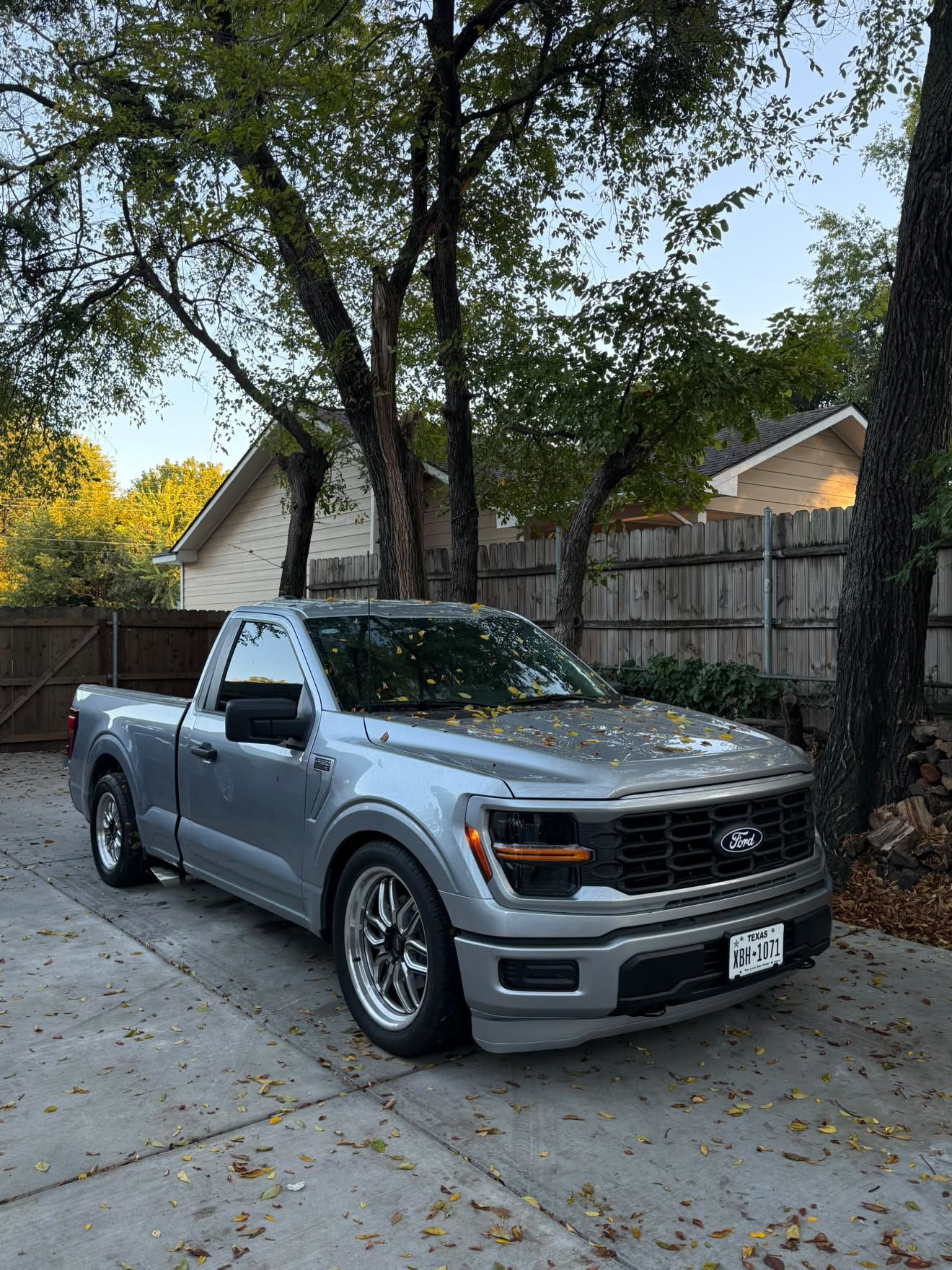 Silver Ford truck after front-end repair