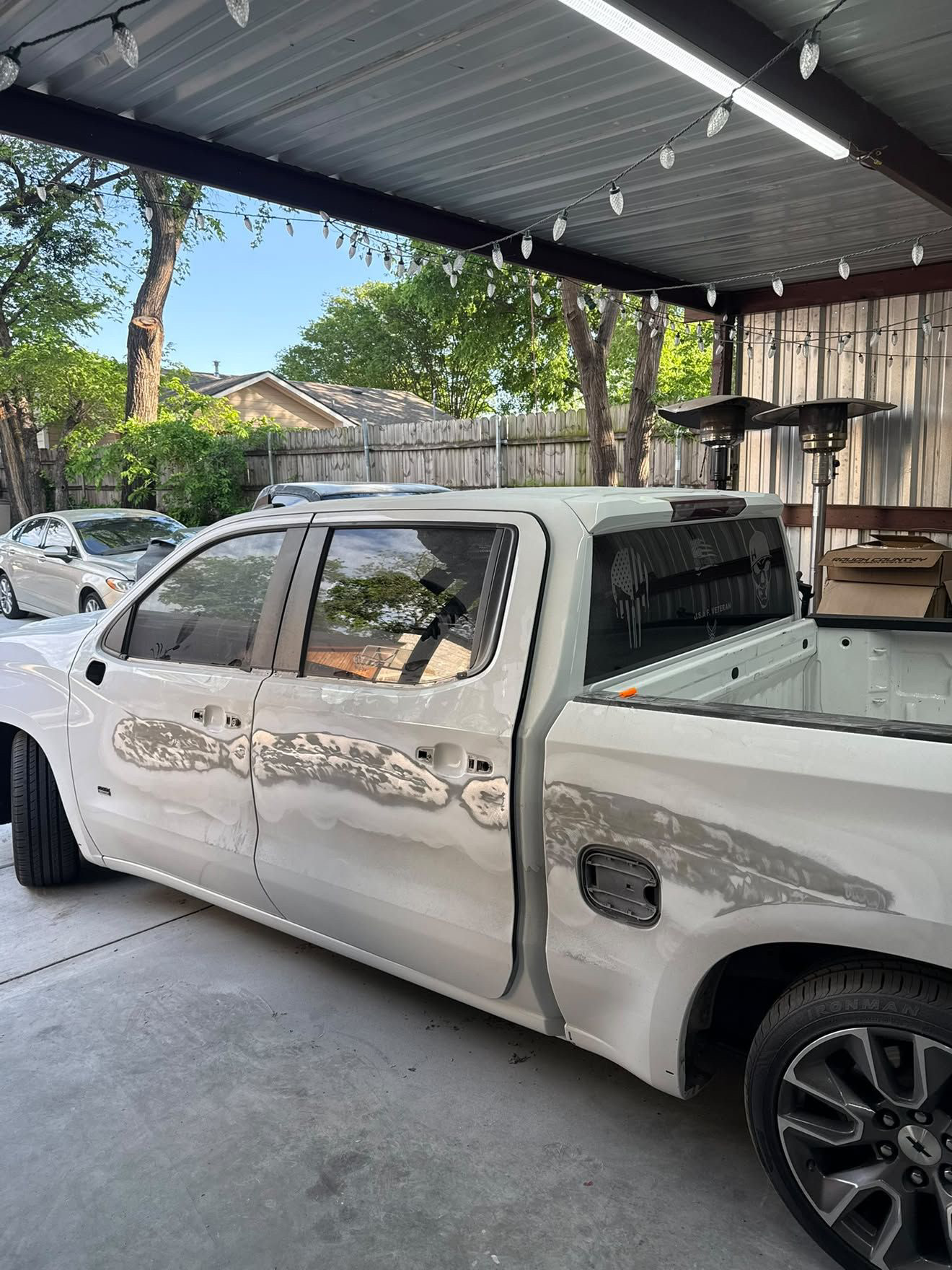 White truck during side panel repair